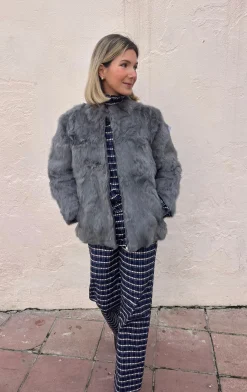 Abrigo pelo natural gris