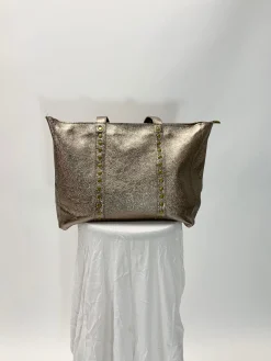 Bolso tachas metalizado