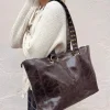 Bolso tachuelas asas