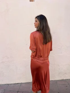 Chaqueta satinada teja