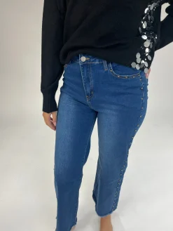 Jeans denim azul tachuelas