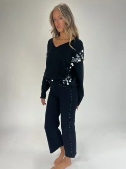Jeans denim negro tachuelas