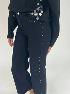 Jeans denim negro tachuelas