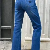 Jeans flare bolsillo estrella