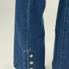 Jeans flare botones bajo