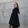Jersey oversize negro cuello pelo