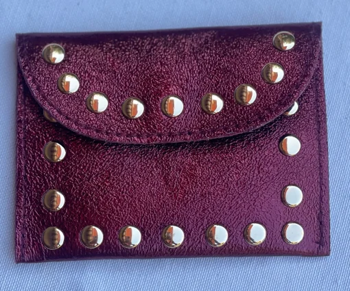 Monedero tachuelas