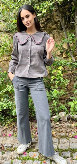 Pantalón tachuelas bolsillos