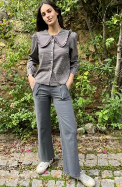Pantalón tachuelas bolsillos