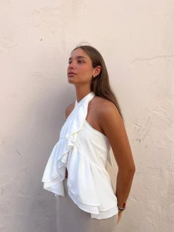 Top blanco al cuello volantes
