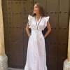 Vestido blanco contraste negro volantes