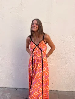 Vestido estampado naranja lazo negro